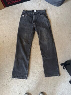 Relaxed Black Men's Jeans with Subtle Fade